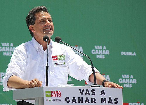 Peña Nieto bleckt dieZähne /@alfaro galan, CC BY-NC-SA 2.0,flickr