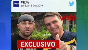 Richtig coole Typen: Der brasilianische Präsident Bolsonaro posiert mit dem Kampfsportler "Djaca" Freitas. Freitas soll geholfen haben, die Waffen zu verstecken, mit denen die linke Stadträtin Marielle Franco erschossen worden ist. Quelle: Democracy Now
